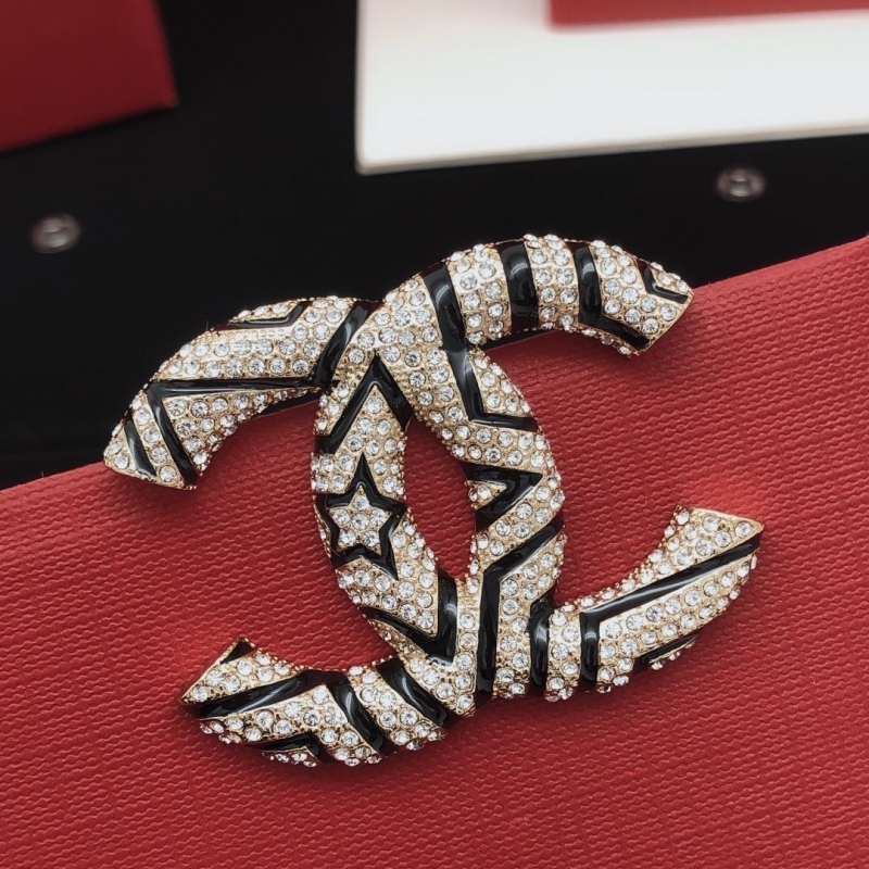 Ch*el brooches